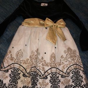 New black velvet and white and gold party dress